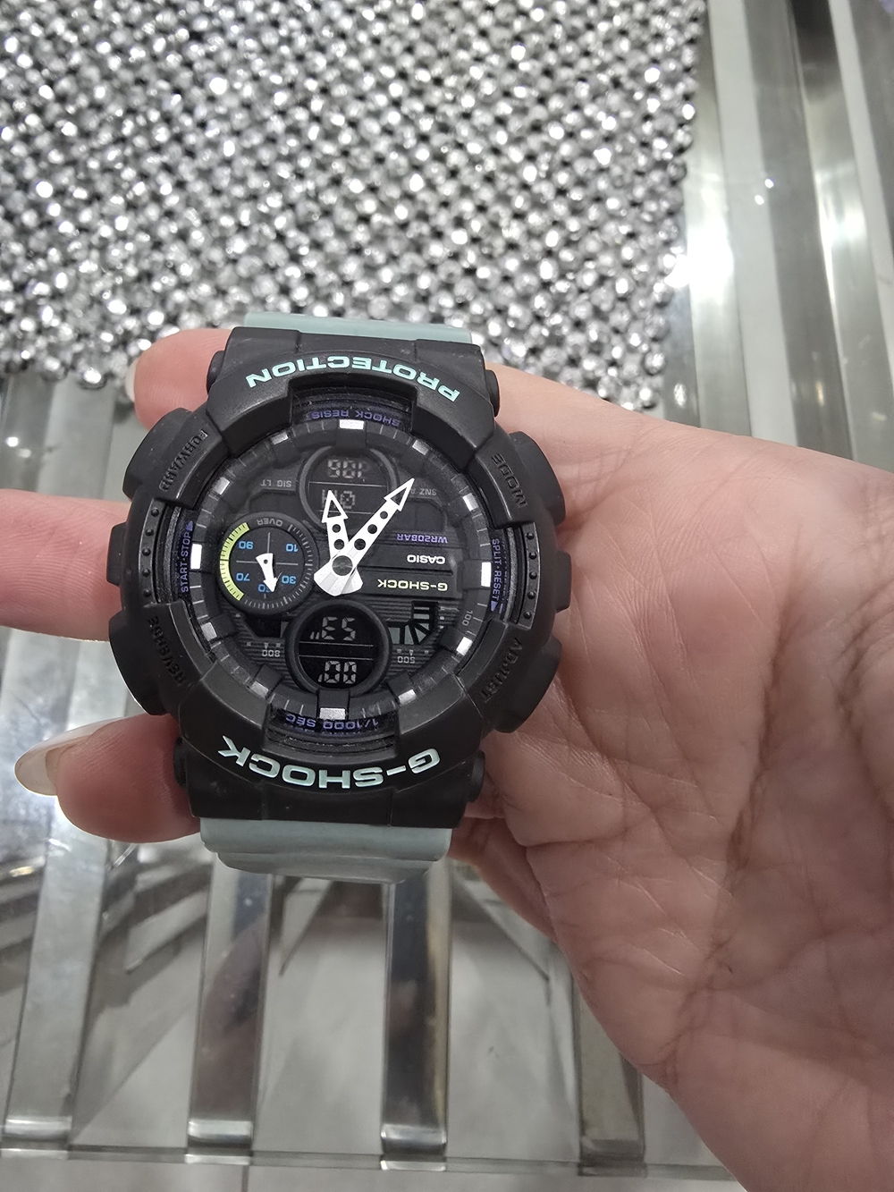G-Shock Black and Mint Shock-Resistant Sports Watch
